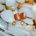 《鴻韻》紅皮和田籽料18k金鑲嵌耳環