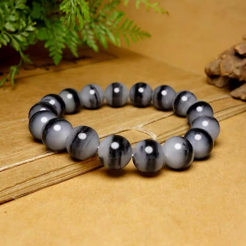 和田玉青花籽料一線天卡12mm