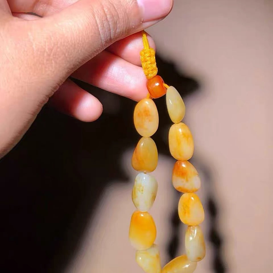 新疆和田玉籽料原石洒金皮手串